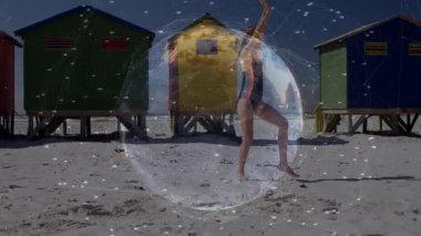 Form teknisyenliği için kız amuda kalkarken kolunun ön kısmında şeffaf bir küre oluşuyor. Spor, spor, spor, dinamik, aktivite, sağlık, spor