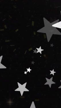 Siyah arka planda kar tanelerinin ve yıldızların animasyonu. Noel, gelenek ve kutlama konsepti dijital olarak oluşturuldu.