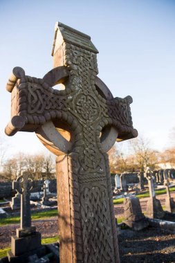 Cemetaries in graveyard against sky