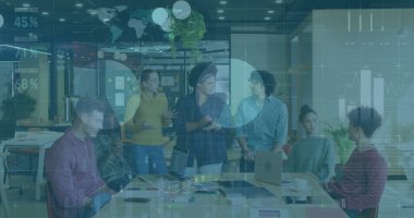 Brainstorming seven colleagues meeting around table in office under analytics, with laptops, notes. Collaboration, teamwork, innovation, modern, corporate, productivity, digital