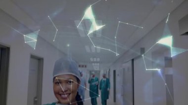 Ağ çizgileri sürükleniyor, dünyayı oluşturuyor, cerrahi ekibi sarıp sarmalıyor sağlık ağını göstermek için yürüyorlar. Tıbbi, teknoloji, yenilik, işbirliği, fütüristik, sağlık, dijital