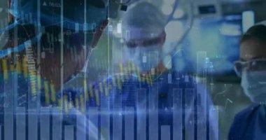 Cerrahi ekip ensizyonu başlatırken finansal tablolar gerçek zamanlı izleme için animasyon yapıyor. Tıbbi, sağlık, analitik, veri, yenilik, takım çalışması, kesinlik