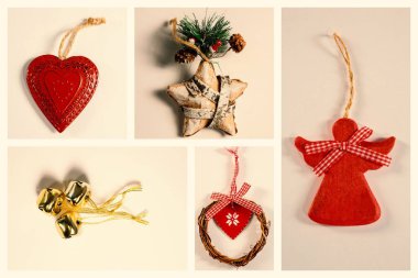 Şenlikli süsler, yüzeyde kalp yıldızı melek çanları çelengi ile düz yerde sergileniyor. Tatil, dekorasyon, el işi, köy, mevsim, kutlama, kış