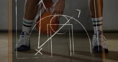 Düşen basketbol topu alan ve çizgi film çizimlerinin rehberliğinde top sürme hareketleri yapan bir sporcu. Sporcu, antrenman, çeviklik, teknik, strateji, spor, hareket