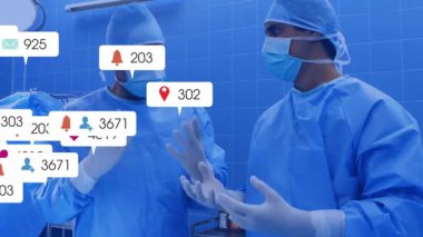 Ameliyathanede tartışan iki cerrah, canlandırılmış simgeler yaratıyor, olay yerini sel basıyor ve hareketleri yavaşlatıyor. Tıbbi, sağlık, dijital teknoloji, yenilik, profesyonellik, iletişim, modern