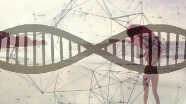 Sörf tahtası sağdan giriliyor. Heliks altında sörf yapmak için kayışları ayarlıyor. Fütürist, dijital, bağlantı, teknoloji, minimalist, sağlıklı, macera