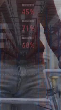 Animation of financial data processing over african american man using smartphone. Global business, finance, computing and data processing concept digitally generated video.