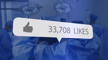 Baş cerrah, cerrahi süitteki başlık ve maske kayışlarını balon sayımı gibi canlandırıyor. Tıbbi, takım çalışması, profesyonellik, yenilik, sağlık, hassasiyet, kısır