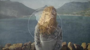 Düşen saçlar teknolojiyi, kollarını açan kadın kutlarken dönen dünya ile örtüşüyor. Macera, keşif, özgürlük, doğa, sükunet, küresel, birlik