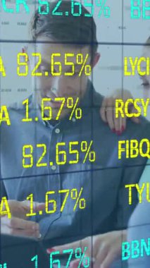 Animation of data processing over caucasian couple using laptop. Global business and digital interface concept digitally generated video.