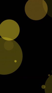 Siyah arkaplanda süzülen ışık lekelerinin canlandırması. parti ve kutlama konsepti dijital olarak oluşturulmuş video.