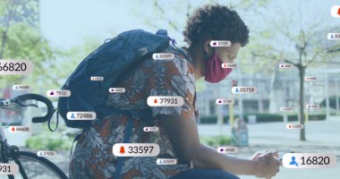 Leaning cyclist in floral shirt red mask checking phone in plaza with bicycle and floating icons. Urban, leisure, casual, modern, technology, lifestyle, vibrant