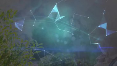 Bahçe manzarası statik çalı ile başlıyor. Sonra kadın başını çevirip teknoloji gösterisi için kablo küresi oluşturuyor. Doğa, yenilik, bağlantı, teknoloji, sürdürülebilirlik, canlılık, gelecek