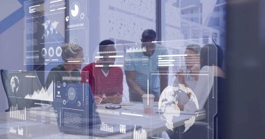 Collaborating professionals in business attire analyzing digital displays in conference room. Business, teamwork, innovation, strategy, anaytics, urban, modern