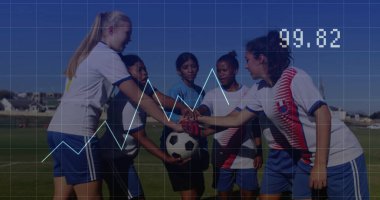 Gathering six soccer players huddling around soccer ball on soccer field, with jerseys and cleats. Athletes, teamwork, outdoor, sport, active, fitness, competition