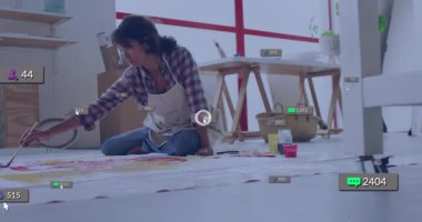 Ressam tuvalde fırça darbeleri yaparken sosyal simgeler pazarlama etkinliğini göstermek için güncelleniyor. Yaratıcı, ifade, boş zaman, minimalist, enerjik, adanmış, üretkenlik