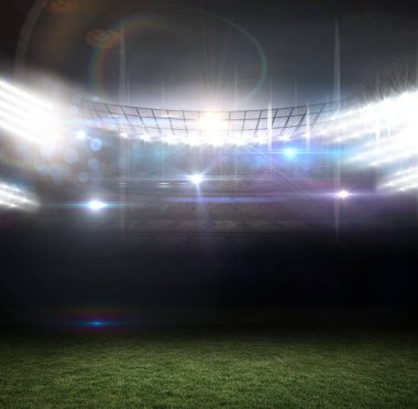 Stadyumun içi geceleri düz tasarımla parlıyor, kıvrımlı projektör kulesi ve çimen sahasını gösteriyor. Spor, aydınlatma, mimari, açık hava, aydınlatma, manzara, altyapı