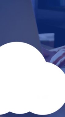 Animation of clouds with icons over caucasian woman using laptop. Global business and digital interface concept digitally generated video.