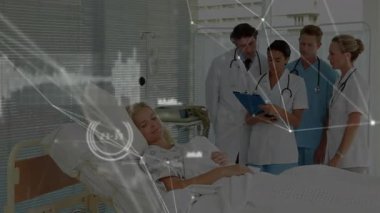 Sağlık ekibi AR 'ı takip ederek hasta dosyalarını inceleyerek başucunda toplanıyor. Tıbbi, takım çalışması, sağlık, teşhis, hastane, veri görselleştirme, klinik