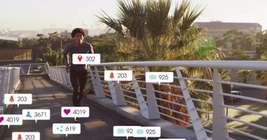 Köprüden koşarak geçen erkek koşucu, yükselen ikonlar ve metriklerle sosyal medya çatışmasına giriyor. Kentsel, fitness, teknoloji, atlet, veri, motivasyon, hareket