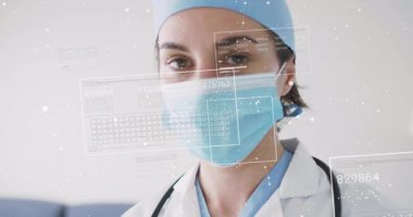 Tıbbi profesyoneller klavyeyi somutlaştırırken gözlerini kapatıyorlar ve hasta verilerini güncelleyen paneller. Gelecek, sağlık, teknoloji, yenilik, profesyonel, dijital, temiz