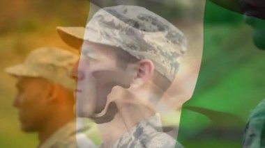 Merkezdeki askerin üzerine zum yapan kamera üç renkli bayrak gibi öne doğru dönüyor. Askeri, disiplin, birlik, vatanseverlik, eğitim, takım çalışması, güç