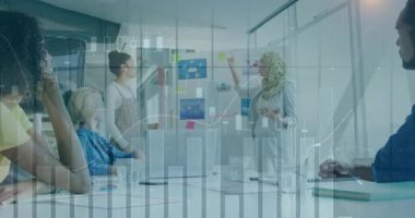 Animation of data processing over diverse business people at office. Global business and digital interface concept digitally generated video.