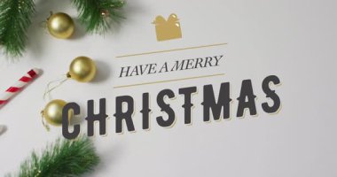 Noel süslemeleriyle ilgili mutlu noel mesajlarının animasyonu. Noel, kutlama ve dijital arayüz konsepti dijital olarak oluşturulmuş video.