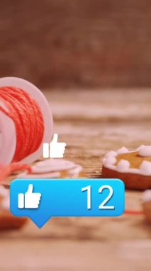 Noel kurabiyeleri üzerine medya simgelerinin canlandırılması. Noel, kutlama ve dijital arayüz kavramı dijital olarak oluşturulmuş video.