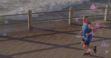 Deniz yolunda yürüyen koşucu, kalp simgeleri ve oklarla eklemleri parlatmayı etkinleştiriyor. Spor, açık hava, teknoloji, sağlık, spor, aktivite, sağlık