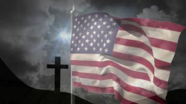 Şafak esintisi bayrağın dalgalanmasını ve dalgalanmasını tetikler. Bu esnekliği temsil eder. Vatanseverlik, esneklik, açık hava, karamsar, sembolik, doğa, ilham