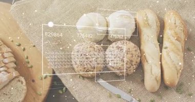 Düz ekmeğin üzerinde kaybolan örtüler sayısal kodları güncellerken sol tarafta dilimlenmiş somun ortaya çıkıyor. Ekmek, fırın ürünleri, zanaatkar, fırın, köy, veri, ağ