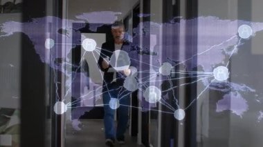Businessman entering office hall holding docs and coffee initiating map overlay pulsing nodes. Corporate, networking, innovation, teamwork, modernity, strategy, communication