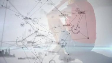 female technology presenter crouching activating network charts around glasses while analyzing data. Digital, innovation, futuristic, visualizations, analytics, tech, scientific