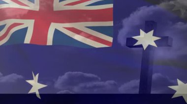 Solgun Avustralya bayrağı rüzgarda sallanıyor, bulutların arasından çıkan çapraz siluet birliği simgeliyor. Vatanseverlik, sembolizm, maneviyat, minimalist, atmosfer, dinginlik, anıt