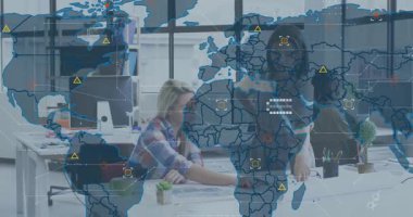 Two designers pointing at blueprint initiating world map graphic fading in with hex grids and nodes. Collaboration, teamwork, innovation, digital visualization, modernoffice, dataanalysis