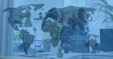 Team analyzing tech data with clear map overlay fading in showing icons and celebrating high-five. Collaboration, technology, data visualization, teamwork, innovation, office environment, analytics