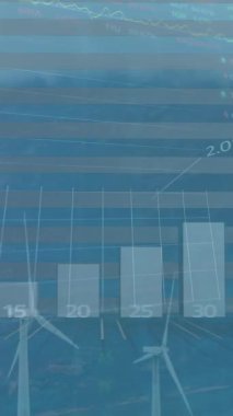Animation of statistical and stock market data processing against spinning windmills on grasslands. Global economy and renewable energy technology concept