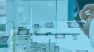 Şırıngayı hazırlayan bilim adamı yüzen panellerin sıvı kayıt ağırlığını taşımasına neden oluyor. Araştırma, yenilik, kesinlik, ölçüm, enstrümantasyon, teknoloji, bilim