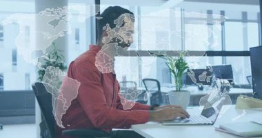 Professional typing laptop and showing animated world map overlay for data analysis jotting notes. Technology, connectivity, innovation, digital, global, workspace, corporate