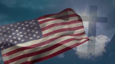 Bulutlar hareket ederken bayrak rüzgarda dalgalanıyor. İnanç özgürlüğünü simgeleyen parlayan haç ortaya çıkıyor. Vatanseverlik, maneviyat, dinginlik, sembolizm, açık hava, doğal, görkemli