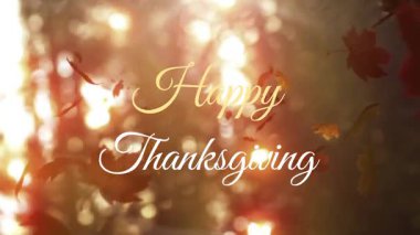 Rüzgârlı esinti portakal yapraklarını sürüklüyor, Şükran Günü metnini çerçeveliyor. Bokeh röfleleri arasında. Sonbahar, yeşillik, dinginlik, doğa, tatil, kutlama, sıcaklık