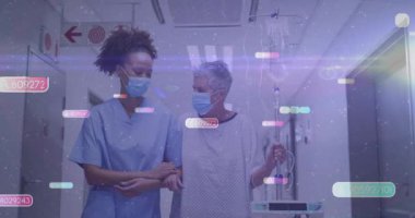 Veri çubuklarından hayati bulguları izlerken hastanın tıbbi koridorda yürümeye başlamasıyla kol kola giren hemşire. Bakıcı, hasta, sağlık, destek, seyahat, ilişki, hastane