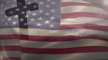 Çapraz siluet ortaya çıktıktan sonra, çim çizgisinde dalgalanan şeffaf bayrak şafak vakti gökyüzünü aydınlatıyordu. Vatanseverlik, şafak, sembolizm, maneviyat, esneklik, dinginlik, eko