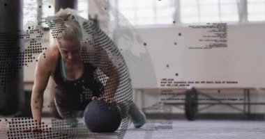 Starting low plank, woman shifting onto med ball doing alternating crossbody push-ups for fitness. Strength, fitness, workout, exercise, athletic, training, conditioning