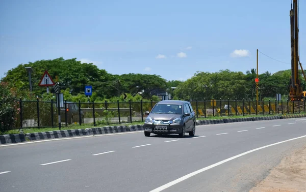 stock image Viluppuram, India: August 28th 2022: Indian National Highway Road Travel. High speed four wheelers vehicle on Indian Road Highways, Vehicle on Indian Road .