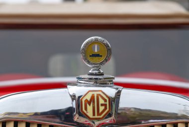 Chennai, India, December 18th 2022: MG retro vintage car display. Morris Garages classic vintage car displayed in the city of Chennai, India. Collection of vintage cars. Old car collection. clipart