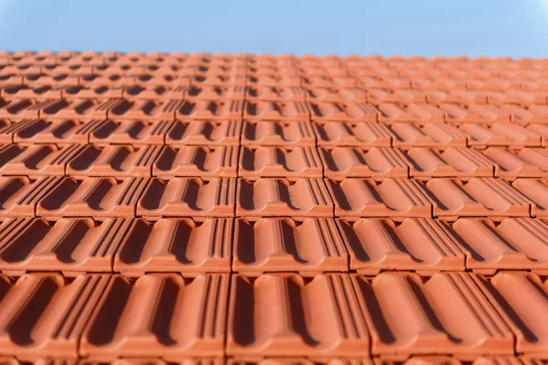 stock image red roof tiles in the house