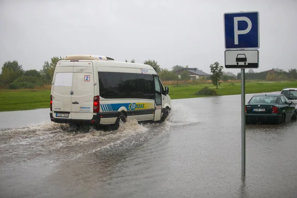 stock image Flooded cars on the street of the city. Street after heavy rain. Water could enter the engine, transmission parts or other places. Disaster Motor Vehicle Insurance Claim Themed. Severe weather concept 09 21 2017