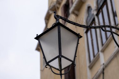 Old wall street lighting, in the old town, Venice, Italy